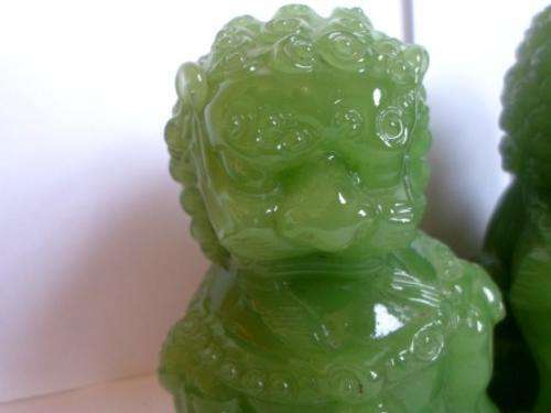 Superb pair of large green Chinese Peking Glass Temple Foo Dogs on camphor wood stands