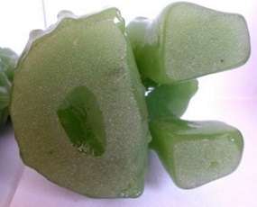 Superb pair of large green Chinese Peking Glass Temple Foo Dogs on camphor wood stands