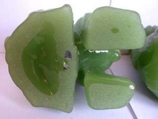 Superb pair of large green Chinese Peking Glass Temple Foo Dogs on camphor wood stands