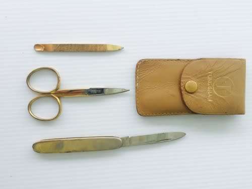 Quality vintage German travelling manicure set in leather case. Scissors, pocket knife & nail file.