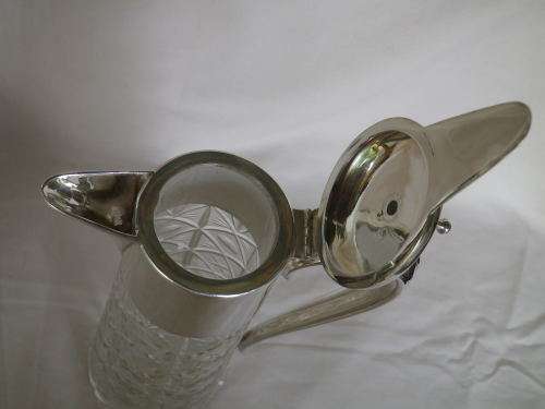 Vintage Silver plate and cut glass claret jug. 30cm tall