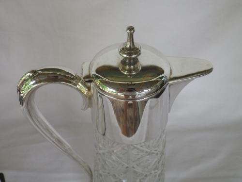 Vintage Silver plate and cut glass claret jug. 30cm tall