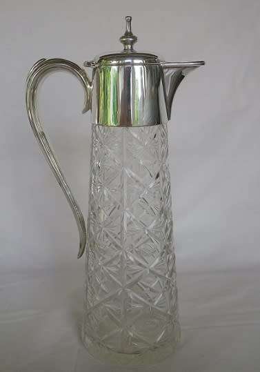 Vintage Silver plate and cut glass claret jug. 30cm tall