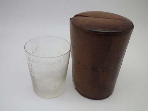Vintage travelling medicine measure in leather case. Finnigans Bond Street, London