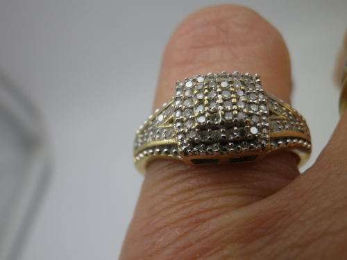 9ct yellow gold and diamond cluster NMJ DESIGNER ring. Diamond: 0.22ct Size: J-K SI Certificate