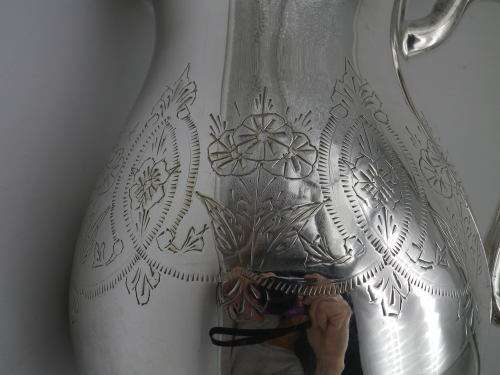 LARGE SILVER PLATED VINTAGE  JUG WITH ICE LIP LOVELY CHASED DECORATION. EXCELLENT CONDITION 20CM