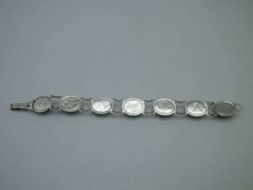 STERLING SILVER and SEVEN semi-precious stone bracelet. OBLO, South Africa 21cm WOW!!!