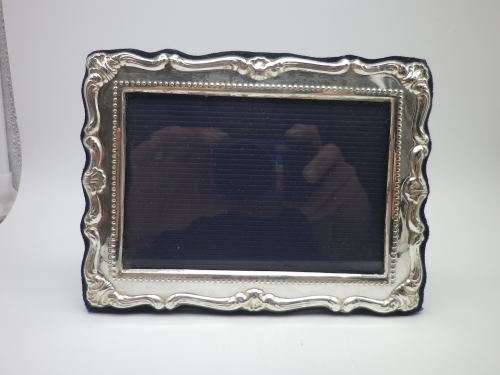 Hallmarked Sterling Silver photo frame.  LONDON, 2000 12cm X 16cm