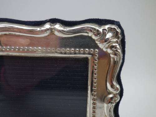 Hallmarked Sterling Silver photo frame.  LONDON, 2000 12cm X 16cm