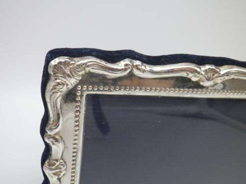 Hallmarked Sterling Silver photo frame.  LONDON, 2000 12cm X 16cm