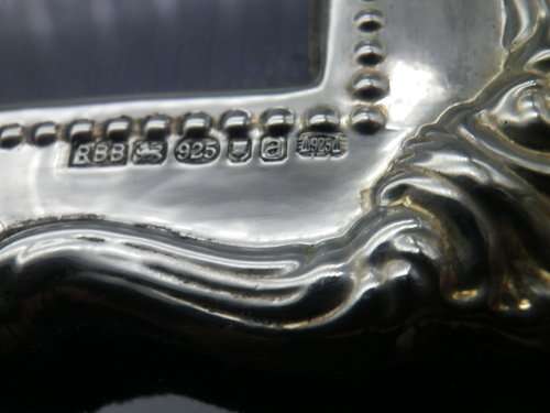 Hallmarked Sterling Silver photo frame.  LONDON, 2000 12cm X 16cm
