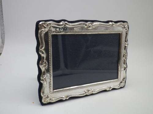 Hallmarked Sterling Silver photo frame.  LONDON, 2000 12cm X 16cm