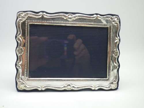 Hallmarked Sterling Silver photo frame.  LONDON, 2000 12cm X 16cm