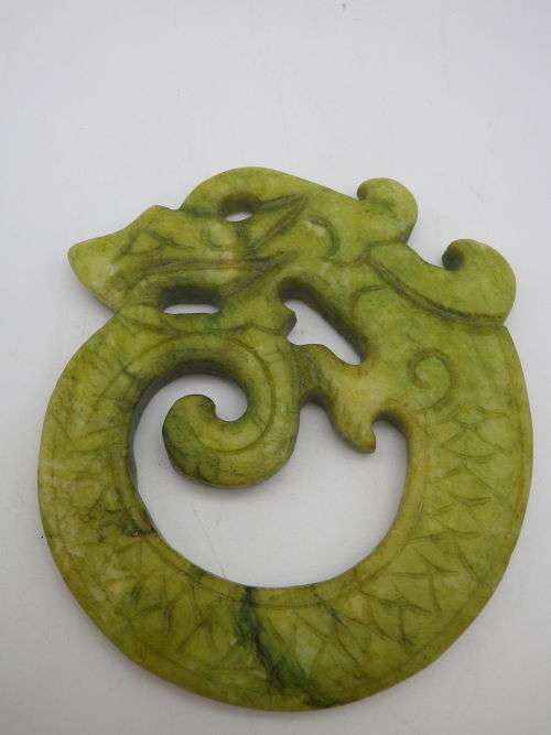 Vintage Chinese Carved Green Stone Dragon Amulet. 9 x 7.5 cm
