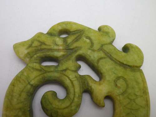 Vintage Chinese Carved Green Stone Dragon Amulet. 9 x 7.5 cm