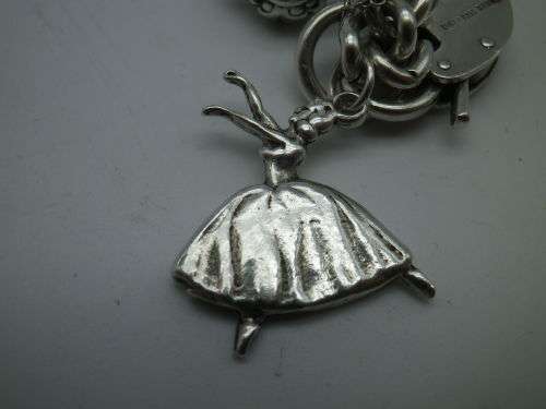 Sterling Silver Vintage Charm bracelet. Hallmarked clasp. Heavy Rare charm. 72grms Excellent quality