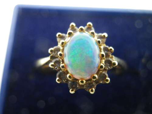 FOR TraHar5654 ONLY PLEASE!! Hallmarked 18ct Yellow Gold, Fire Opal and Diamond Ring. Size J.