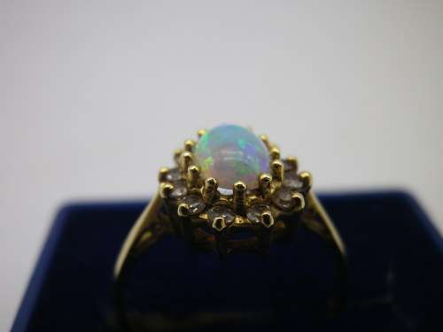 FOR TraHar5654 ONLY PLEASE!! Hallmarked 18ct Yellow Gold, Fire Opal and Diamond Ring. Size J.