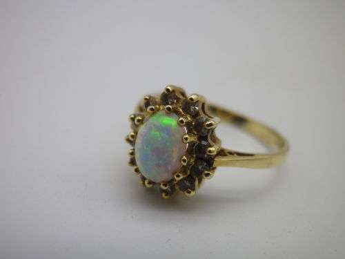 FOR TraHar5654 ONLY PLEASE!! Hallmarked 18ct Yellow Gold, Fire Opal and Diamond Ring. Size J.
