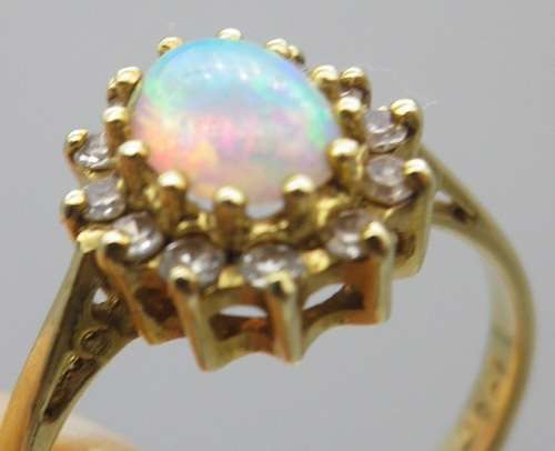 FOR TraHar5654 ONLY PLEASE!! Hallmarked 18ct Yellow Gold, Fire Opal and Diamond Ring. Size J.