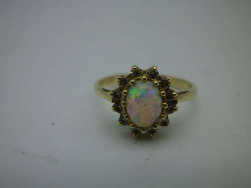 FOR TraHar5654 ONLY PLEASE!! Hallmarked 18ct Yellow Gold, Fire Opal and Diamond Ring. Size J.