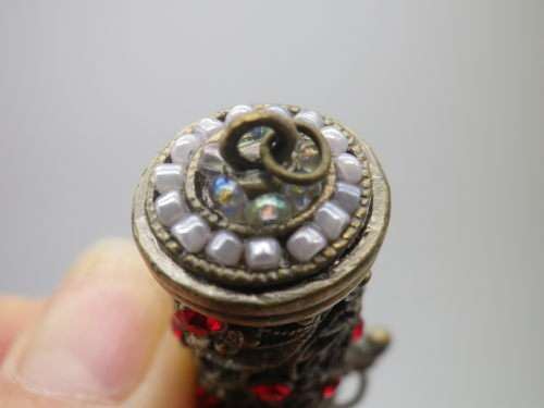 PERFUME BOTTLE PENDANT. Bronze tone metal with red glass beads. Intact. FAB!!!