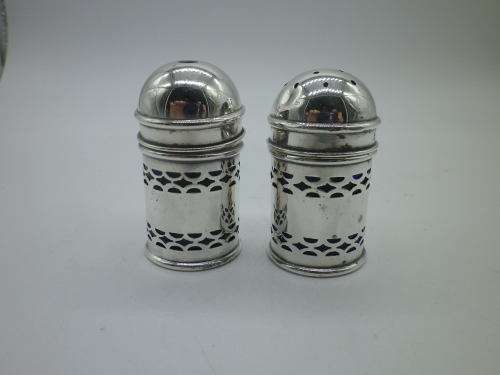 Birmingham 1926 Hallmarked Silver salt and pepper set. Original blue glass liners  Maker: K & L