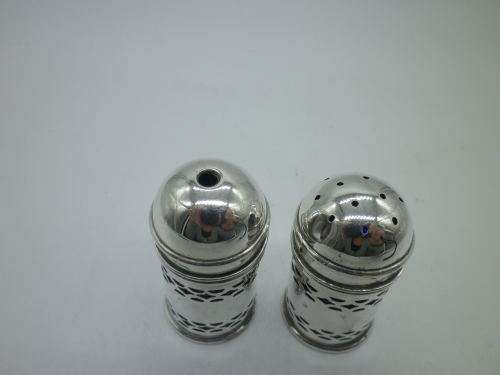 Birmingham 1926 Hallmarked Silver salt and pepper set. Original blue glass liners  Maker: K & L