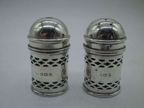 Birmingham 1926 Hallmarked Silver salt and pepper set. Original blue glass liners  Maker: K & L