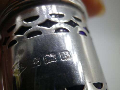 Birmingham 1926 Hallmarked Silver salt and pepper set. Original blue glass liners  Maker: K & L