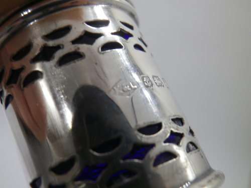 Birmingham 1926 Hallmarked Silver salt and pepper set. Original blue glass liners  Maker: K & L