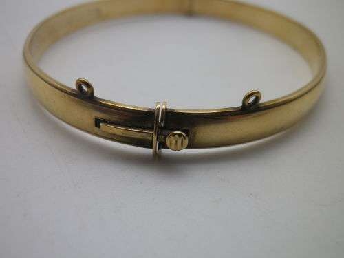 FOR PRANAI ONLY PLEASE!! Vintage 9ct Gold clip bangle with bronze core.