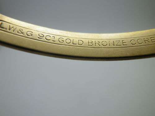 FOR PRANAI ONLY PLEASE!! Vintage 9ct Gold clip bangle with bronze core.