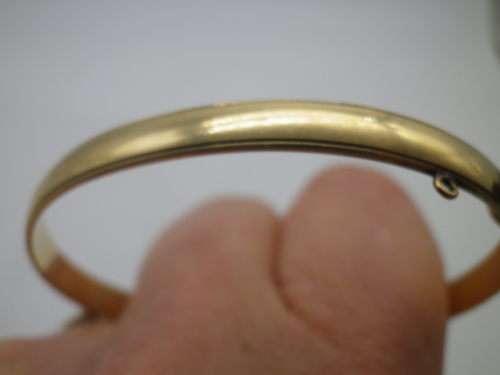 FOR PRANAI ONLY PLEASE!! Vintage 9ct Gold clip bangle with bronze core.