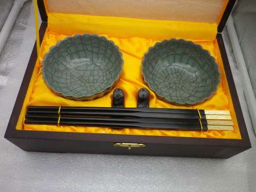 Handsome pair Chinese crackle glaze porcelain rice bowls with carved ebony chopsticks & stand.