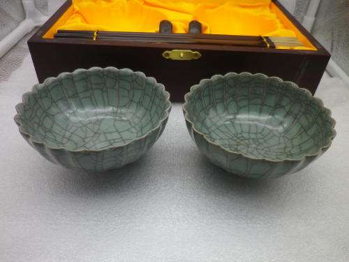 Handsome pair Chinese crackle glaze porcelain rice bowls with carved ebony chopsticks & stand.