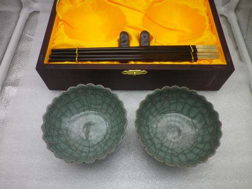 Handsome pair Chinese crackle glaze porcelain rice bowls with carved ebony chopsticks & stand.