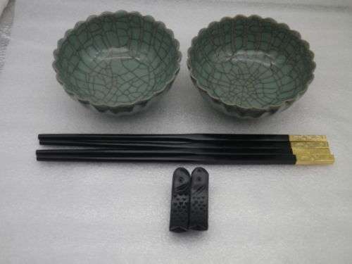 Handsome pair Chinese crackle glaze porcelain rice bowls with carved ebony chopsticks & stand.
