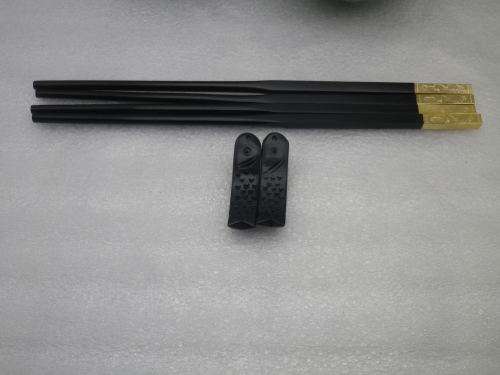 Handsome pair Chinese crackle glaze porcelain rice bowls with carved ebony chopsticks & stand.