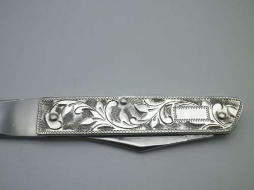 Sterling Silver Vintage knife & letter opener combo. Lovely chased detail. 17cm