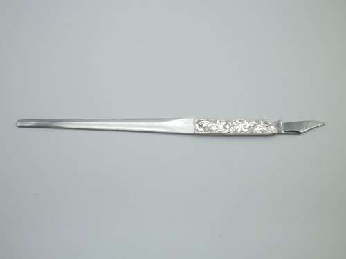 Sterling Silver Vintage knife & letter opener combo. Lovely chased detail. 17cm