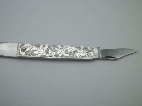 Sterling Silver Vintage knife & letter opener combo. Lovely chased detail. 17cm