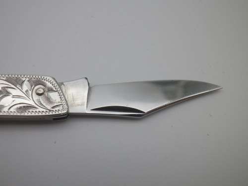 Sterling Silver Vintage knife & letter opener combo. Lovely chased detail. 17cm