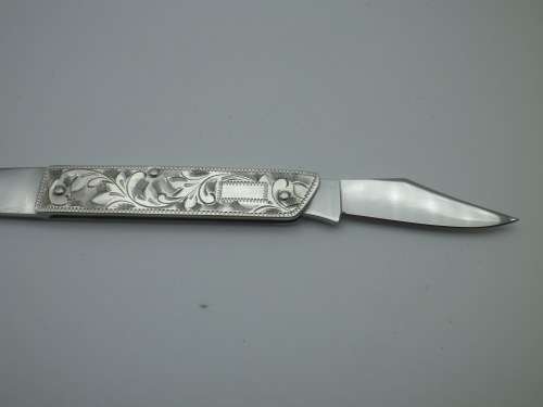 Sterling Silver Vintage knife & letter opener combo. Lovely chased detail. 17cm