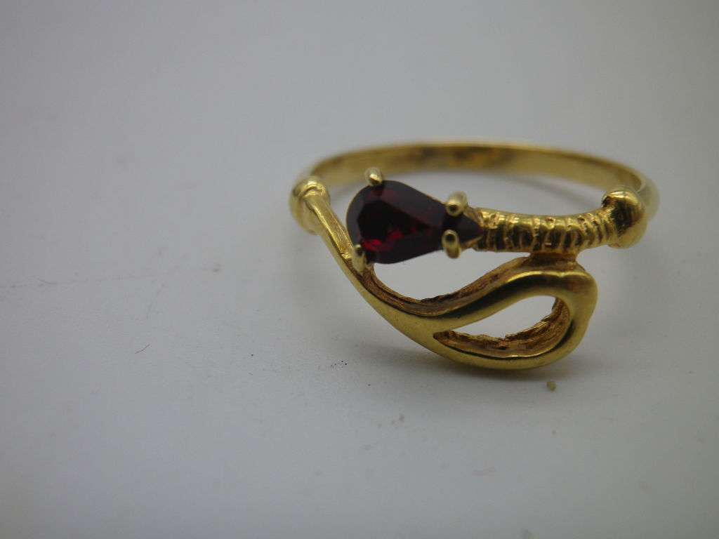 18ct Gold ring with red pear shaped stone- possibly Ruby. Size N. Approx 2grms