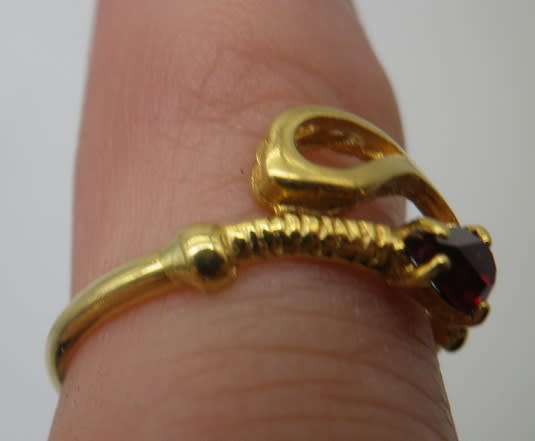 18ct Gold ring with red pear shaped stone- possibly Ruby. Size N. Approx 2grms