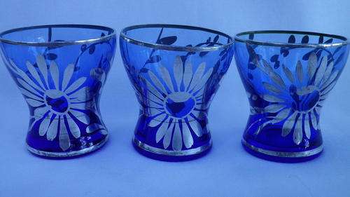 Three gorgeous cobalt blue sherry/liquer glasses with silver overlay. Too beautiful!