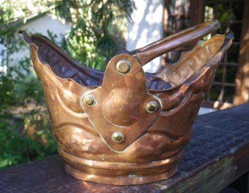 Beautiful, rather unusual very good quality copper basket with brass rivets & moveable handle