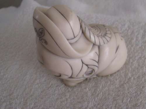 JOHN BICCARD FIGURINE