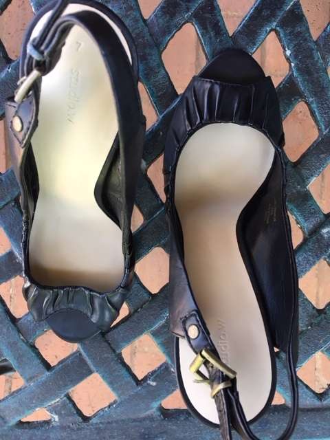 Black peep-toe sling back heels